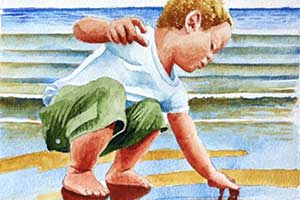 child touching water at the beach